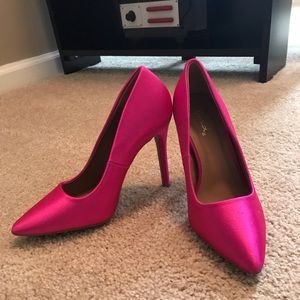 Woman’s hot pink heels